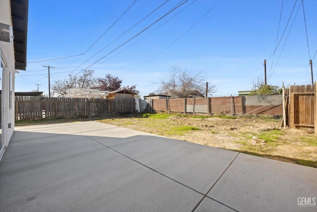 3409 Lotus Ln, Bakersfield, CA 93307 - fenced backyard featuring a patio
