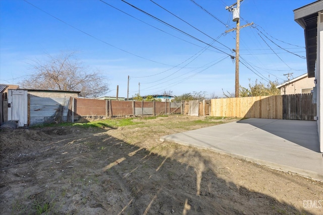 3409 Lotus Ln, Bakersfield, CA 93307 - fenced backyard featuring a patio