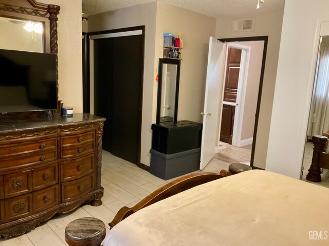 1904 Raymond A Spruance Ct, Bakersfield, CA 93304 - bedroom with a textured ceiling