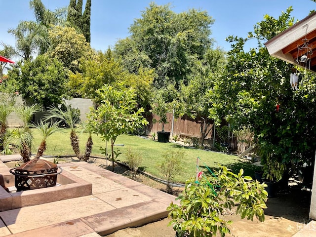 1904 Raymond A Spruance Ct, Bakersfield, CA 93304 - view of patio / terrace with an outdoor fire pit