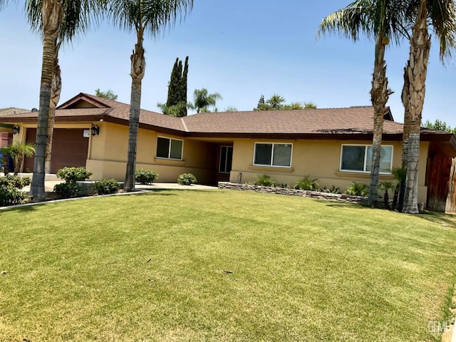 1904 Raymond A Spruance Ct, Bakersfield, CA 93304 - ranch-style home featuring stucco siding, a front lawn, and a garage