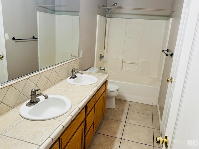 3614 White Sands Dr, Bakersfield, CA 93313 - full bath with tasteful backsplash, toilet, tile patterned floors, double vanity, and shower / washtub combination