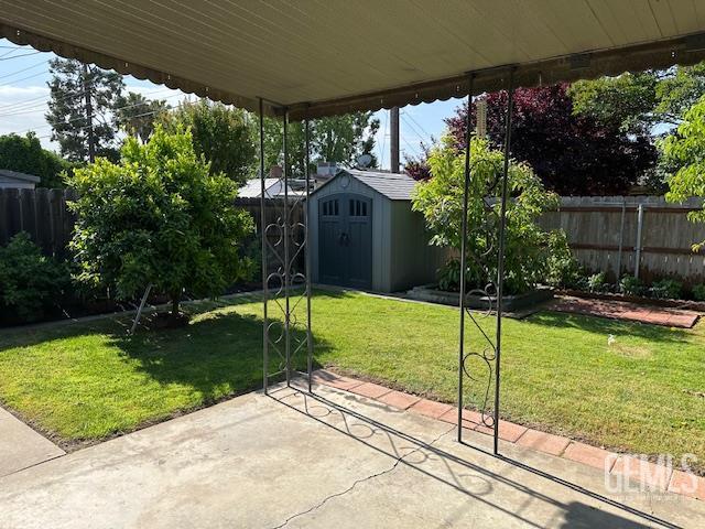 820 Park St, Lodi, CA 95240 - view of patio with a storage unit and an outdoor structure