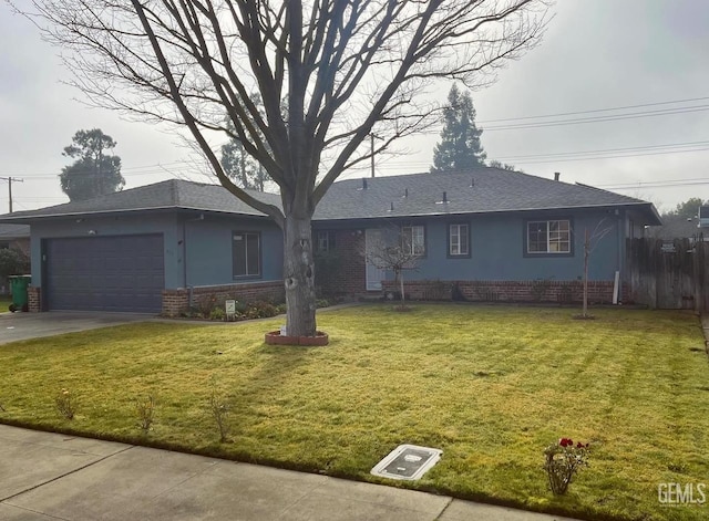 single story home with a garage and a front yard