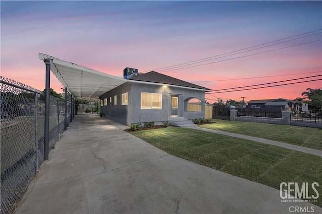 301 Kincaid St, Bakersfield, CA 93307 - view of front of home featuring concrete driveway and stucco siding