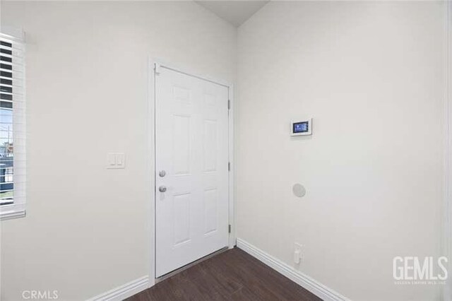 301 Kincaid St, Bakersfield, CA 93307 - interior space with baseboards and dark wood finished floors