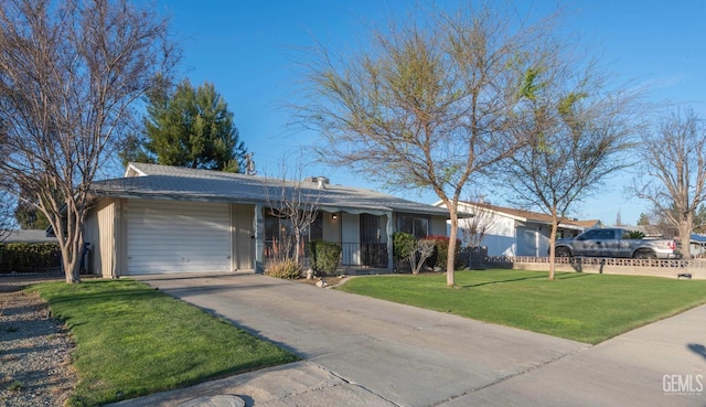 ranch-style house with a garage, concrete driveway, and a front yard