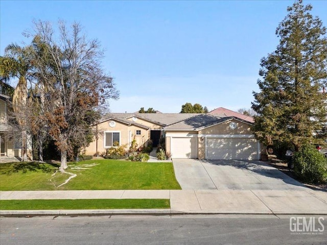 view of front of house featuring a garage and a front lawn