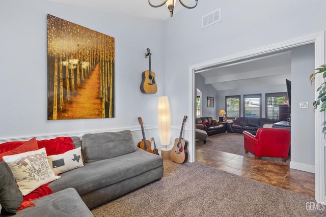 tiled living area with baseboards and visible vents