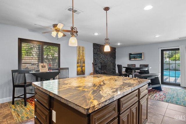 kitchen with visible vents, pendant lighting, baseboards, recessed lighting, and a ceiling fan