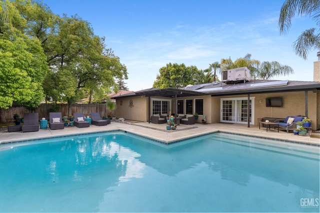 view of pool with an outdoor hangout area, fence, a fenced in pool, and a patio