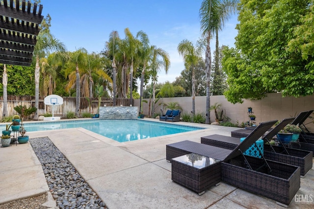 view of pool featuring a fenced in pool, a fenced backyard, and a patio