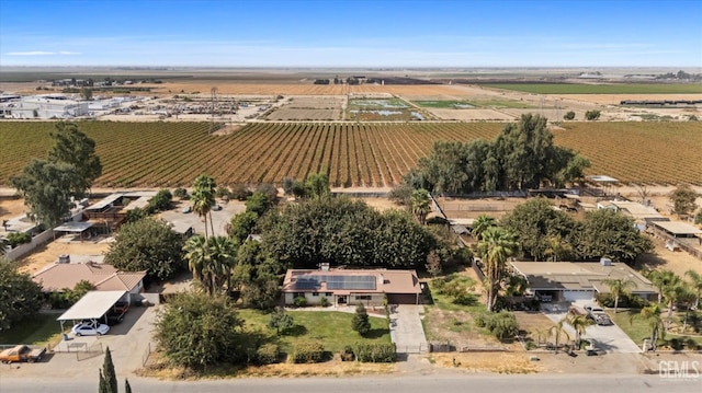 birds eye view of property with a rural view