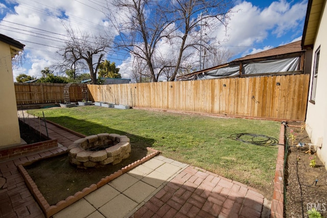 view of yard with a fenced backyard and a patio