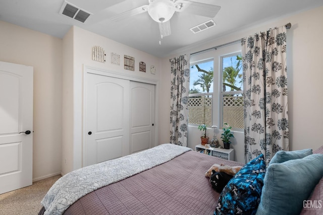 bedroom with carpet floors, a closet, and ceiling fan