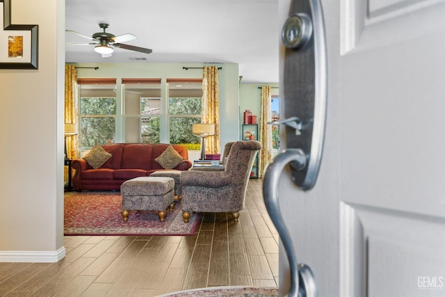 living room featuring ceiling fan