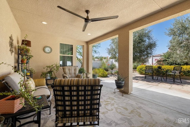 view of patio featuring outdoor lounge area and ceiling fan