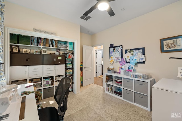 office featuring ceiling fan and washer / dryer