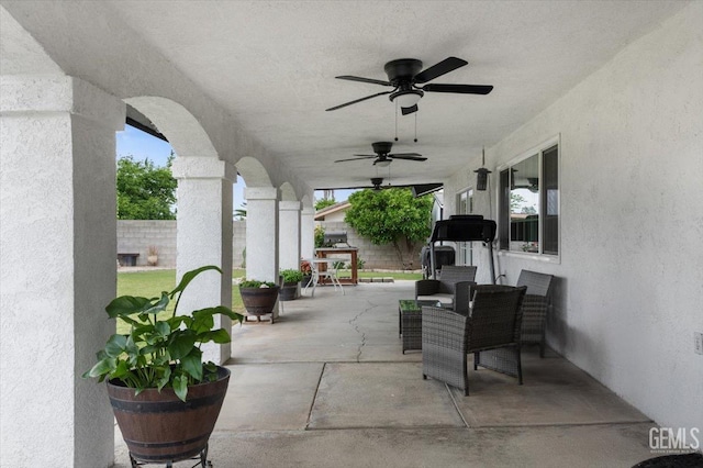 view of patio featuring ceiling fan and a fenced backyard
