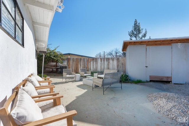 909 Oberlin Ct, Bakersfield, CA 93305 - view of patio / terrace featuring an outdoor living space and a shed