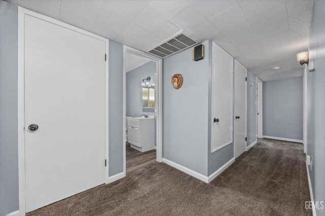 4418 Kevin Dr, Bakersfield, CA 93308 - hallway featuring carpet and baseboards