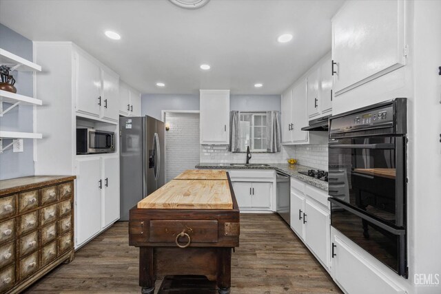 4418 Kevin Dr, Bakersfield, CA 93308 - kitchen featuring black appliances, white cabinetry, backsplash, and recessed lighting