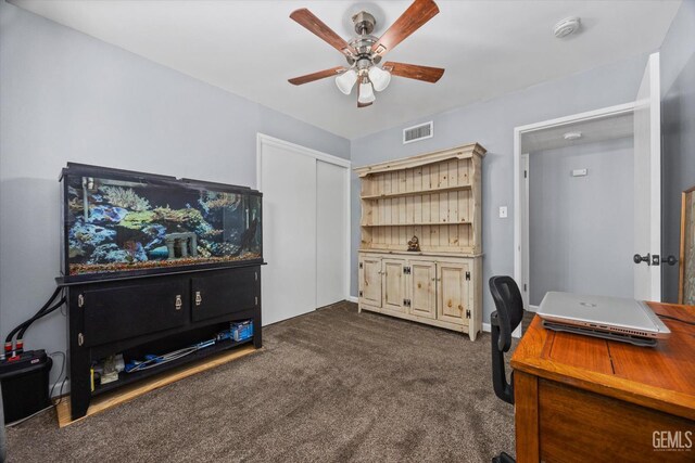 4418 Kevin Dr, Bakersfield, CA 93308 - home office with a ceiling fan and dark carpet