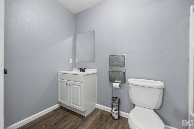 4418 Kevin Dr, Bakersfield, CA 93308 - bathroom with vanity and wood finished floors