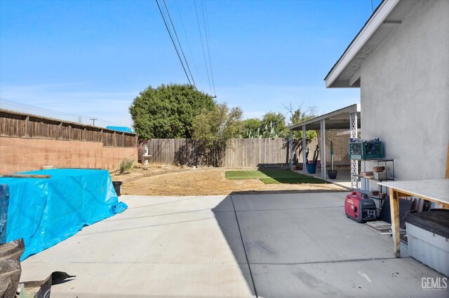4418 Kevin Dr, Bakersfield, CA 93308 - fenced backyard with a patio