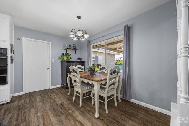4418 Kevin Dr, Bakersfield, CA 93308 - dining room featuring dark wood-style flooring and a chandelier