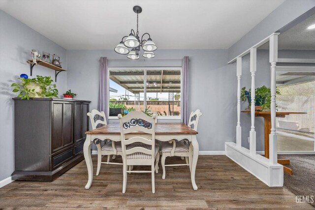 4418 Kevin Dr, Bakersfield, CA 93308 - dining space featuring a chandelier and wood finished floors