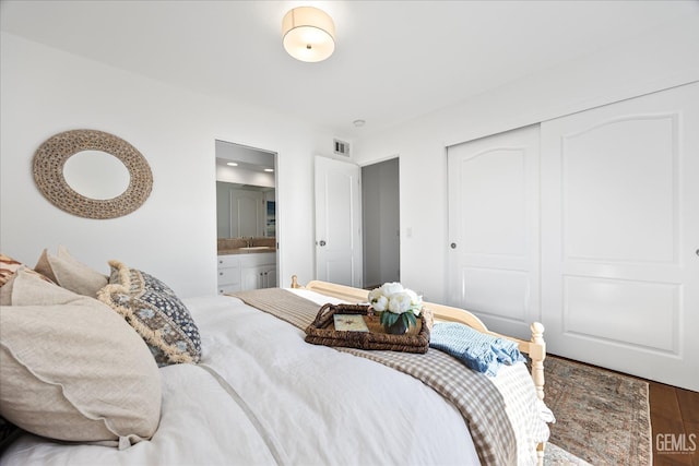 48 16th St, Cayucos, CA 93430 - bedroom with a closet, ensuite bathroom, and wood finished floors