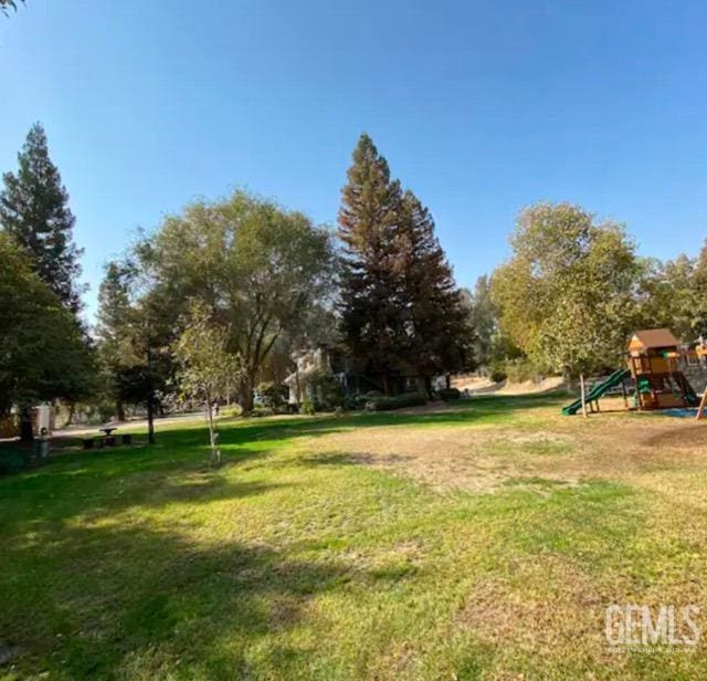 view of yard with a playground