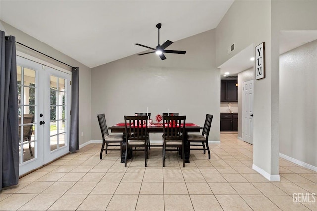 dining area featuring light tile patterned floors, baseboards, visible vents, and french doors