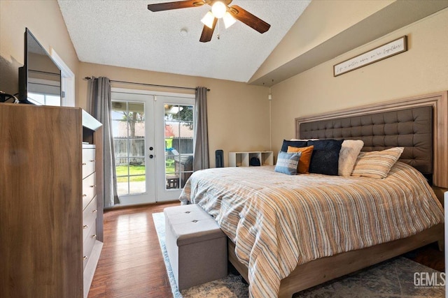 bedroom featuring dark wood-style floors, access to outside, vaulted ceiling, a textured ceiling, and french doors