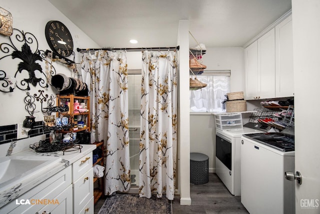 1102 Oleander Ave, Bakersfield, CA 93304 - kitchen featuring dark wood finished floors, white cabinets, washing machine and clothes dryer, light countertops, and a sink