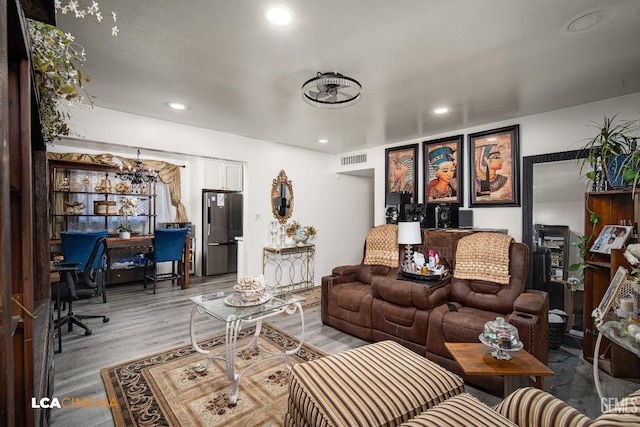 1102 Oleander Ave, Bakersfield, CA 93304 - living area featuring an office area, light wood-style flooring, and recessed lighting