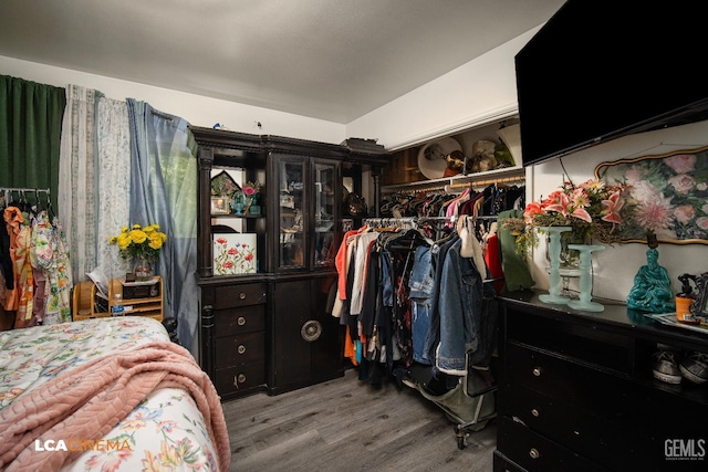 1102 Oleander Ave, Bakersfield, CA 93304 - bedroom featuring a closet and wood finished floors