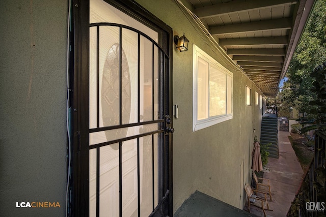 1102 Oleander Ave, Bakersfield, CA 93304 - doorway to property with stucco siding