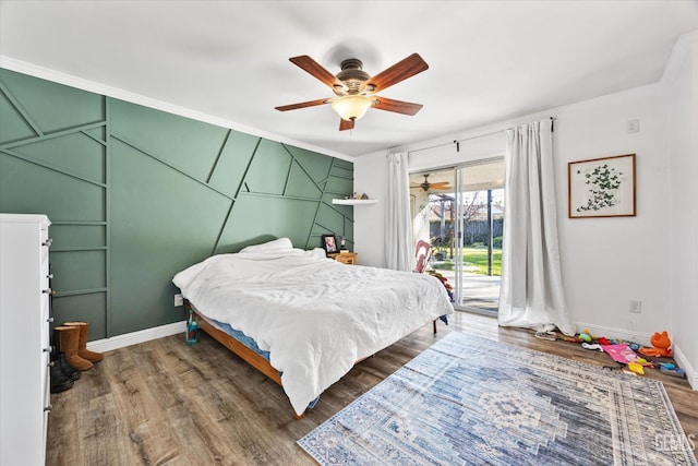 bedroom featuring ceiling fan, access to outside, and wood-type flooring