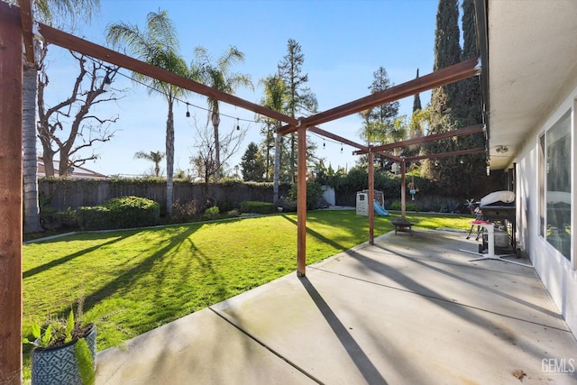 view of patio / terrace with grilling area and a pergola