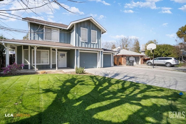 view of front of house with a garage, driveway, a porch, a front lawn, and board and batten siding