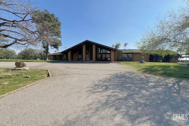 view of front of home with a front yard