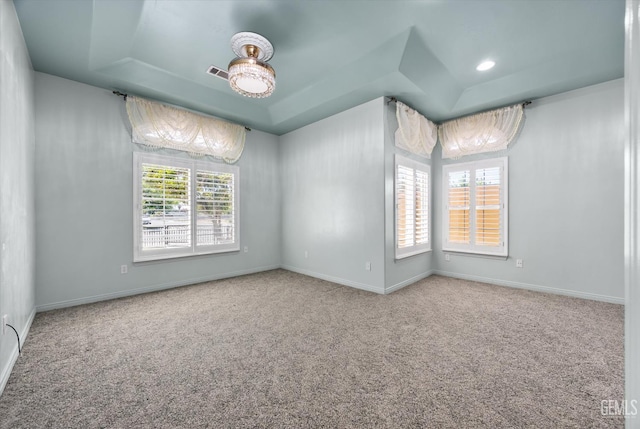 200 Justin Ct, Shafter, CA 93263 - carpeted spare room with a raised ceiling and baseboards