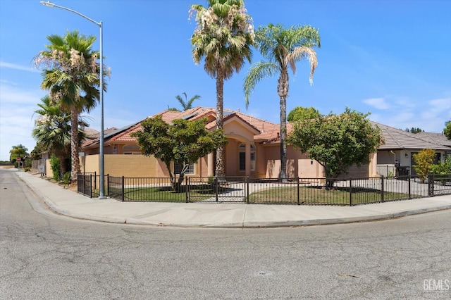 200 Justin Ct, Shafter, CA 93263 - obstructed view of property featuring a tiled roof and stucco siding