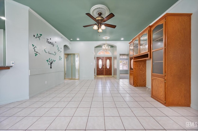 200 Justin Ct, Shafter, CA 93263 - foyer with a chandelier, ceiling fan, arched walkways, light tile patterned floors, and recessed lighting
