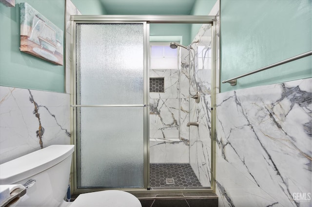 200 Justin Ct, Shafter, CA 93263 - bathroom featuring tile walls and a marble finish shower