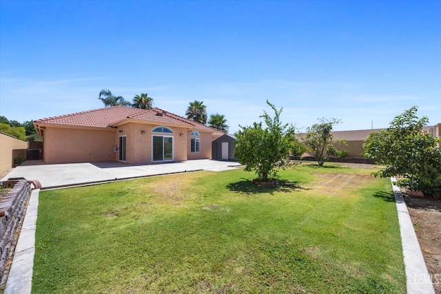 200 Justin Ct, Shafter, CA 93263 - rear view of property featuring a patio, a tile roof, and stucco siding