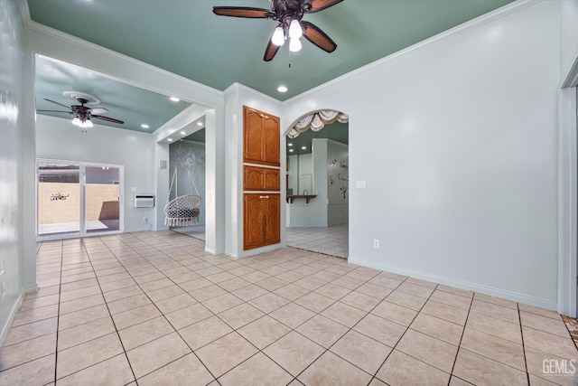 200 Justin Ct, Shafter, CA 93263 - empty room featuring ceiling fan, light tile patterned floors, crown molding, recessed lighting, and arched walkways