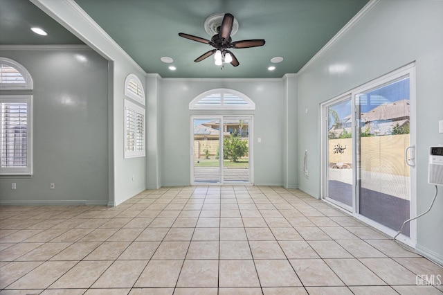 200 Justin Ct, Shafter, CA 93263 - unfurnished room with ornamental molding, plenty of natural light, light tile patterned floors, and ceiling fan